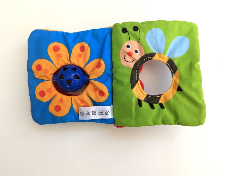 Babybuch aus Stoff mit Rassel - Ravensburger, 3-12 Monate